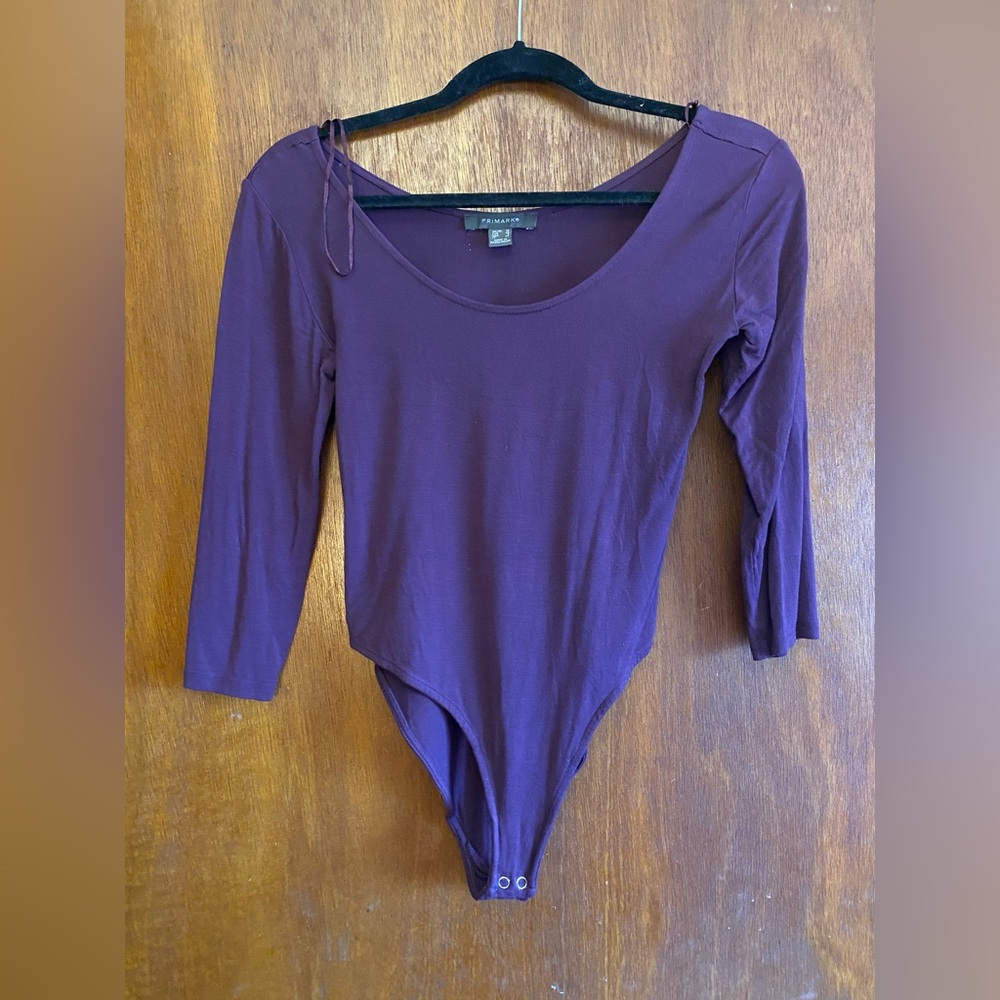 PRIMARK QUARTER SLEEVE BODY SUIT
